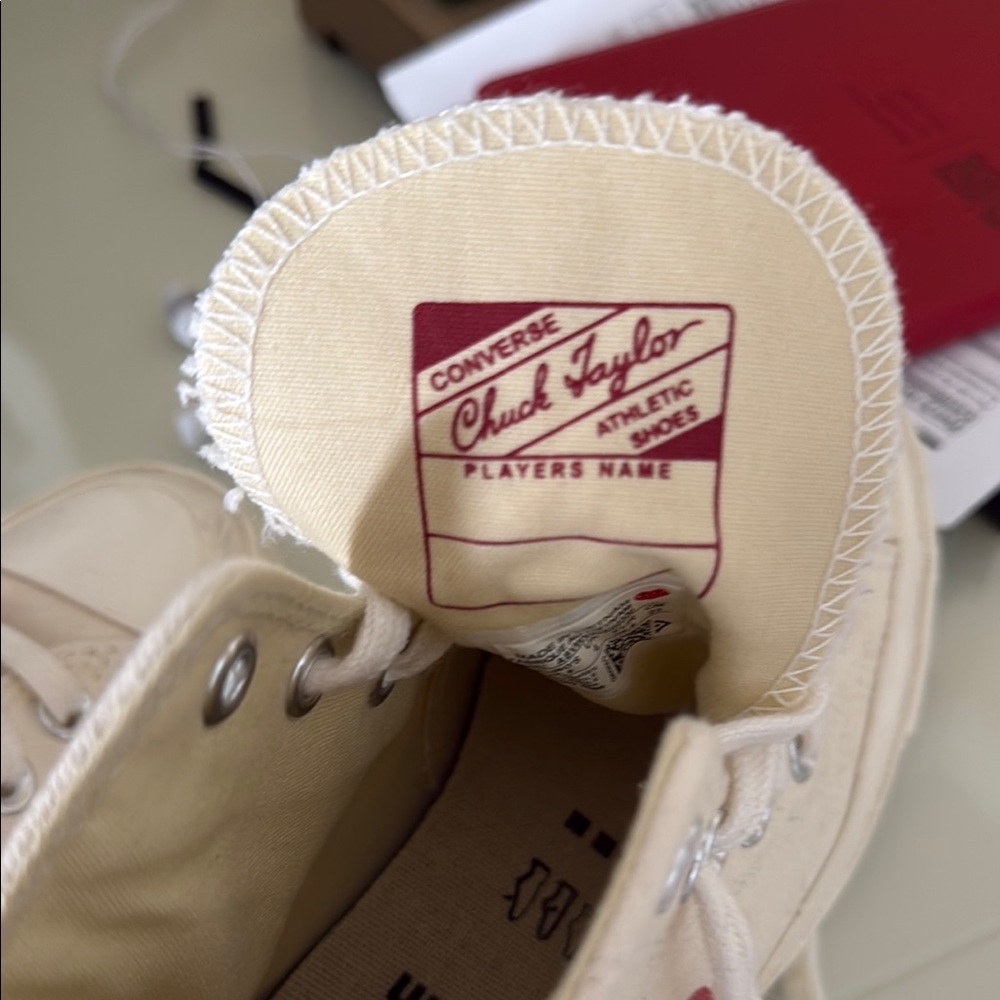 Converse Chuck Taylor High-Tops in Cream